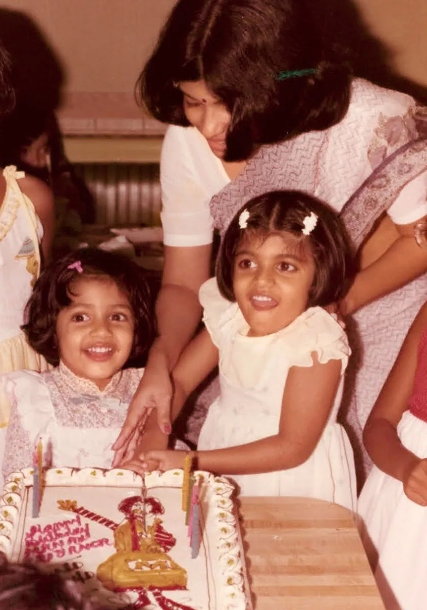 Radhakrishnan with sister Manavi on her third birthday. (Supplied photo)