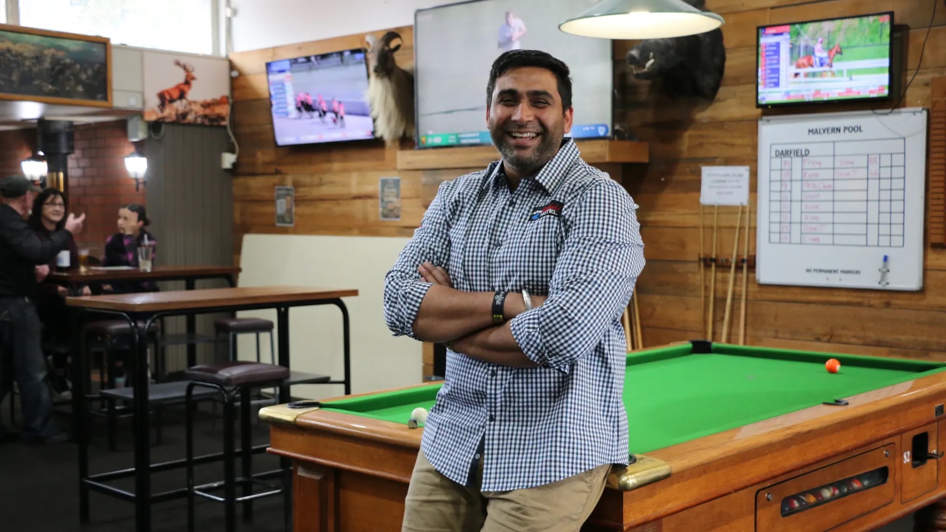 Darfield Hotel owner Pravesh Kumar inside his country pub. (RNZ/Anisha Satya)