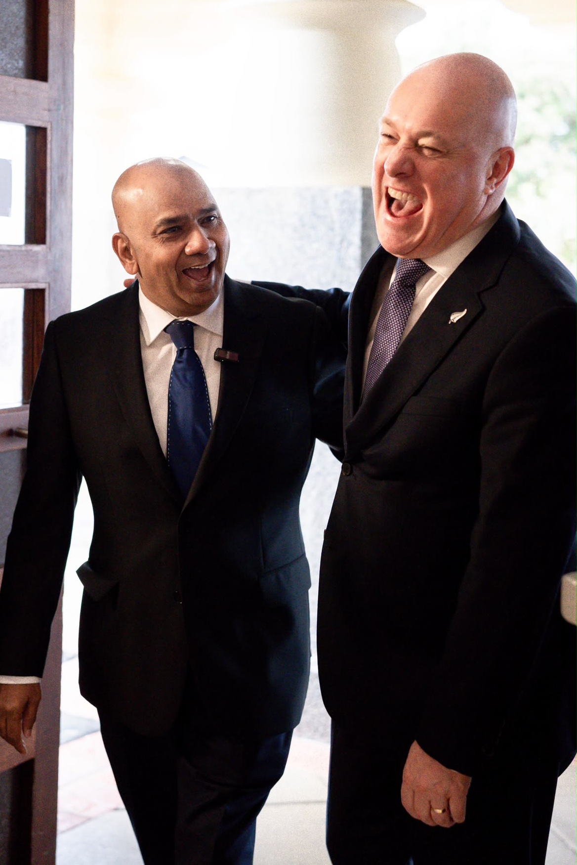 Muthu shares a light moment with prime minister Christopher Luxon. (Supplied photo)