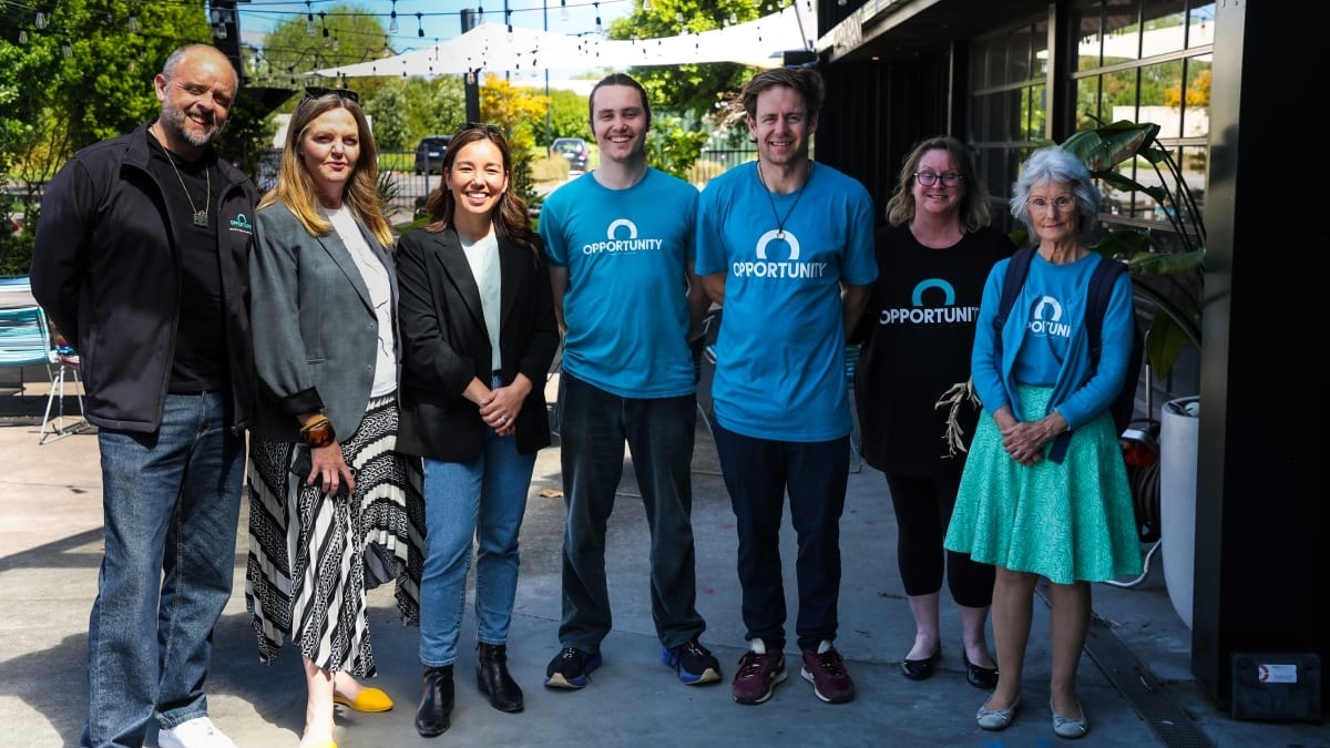 Opportunity leader Qiulae Wong poses for a photo with volunteers during a campaign event in West Auckland. (RNZ/Blessen Tom)