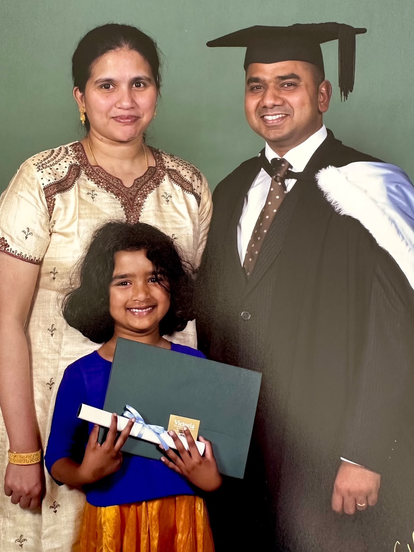 Muthu with his wife and second daughter Mira in 2005. (Supplied photo)