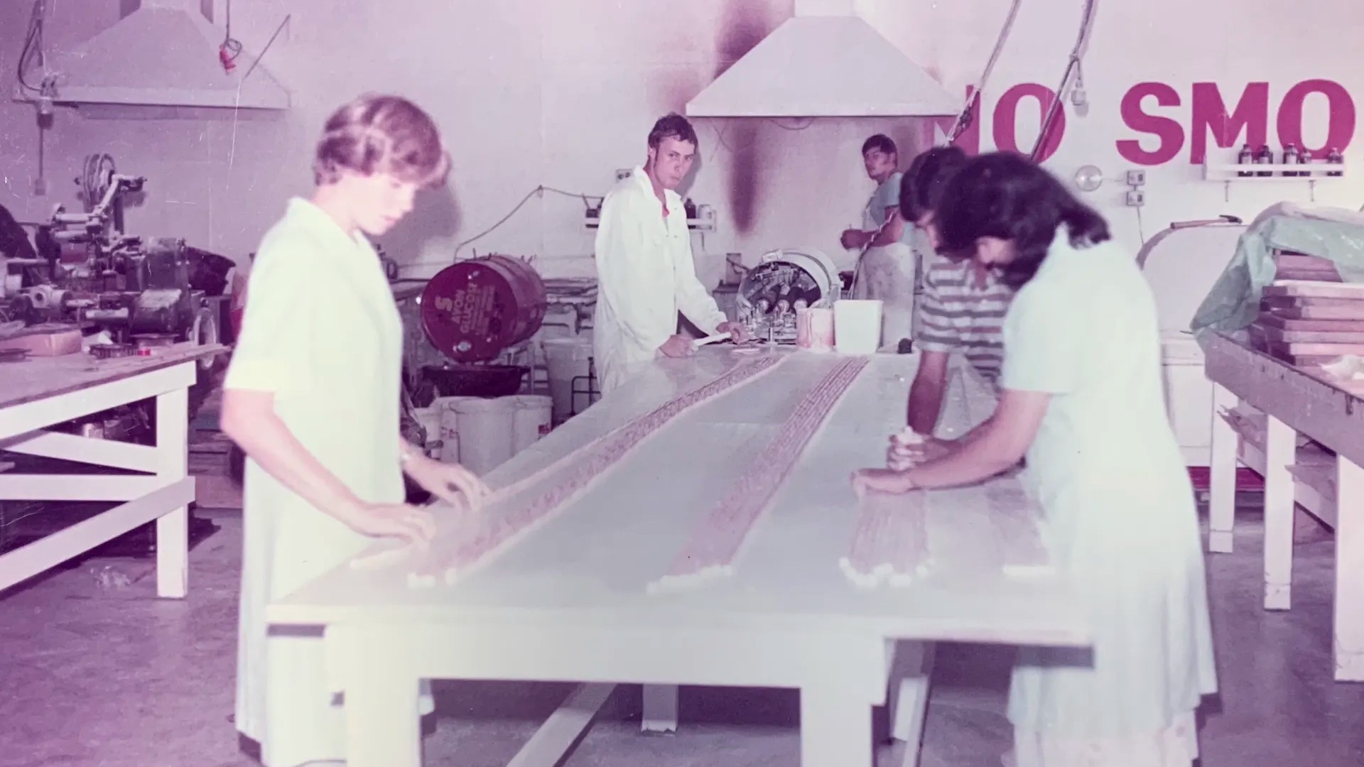 Lollies from Horners were mostly made by hand in 1984. Vina Bhikha, Dhiru's wife, is on the right. (Supplied photo)