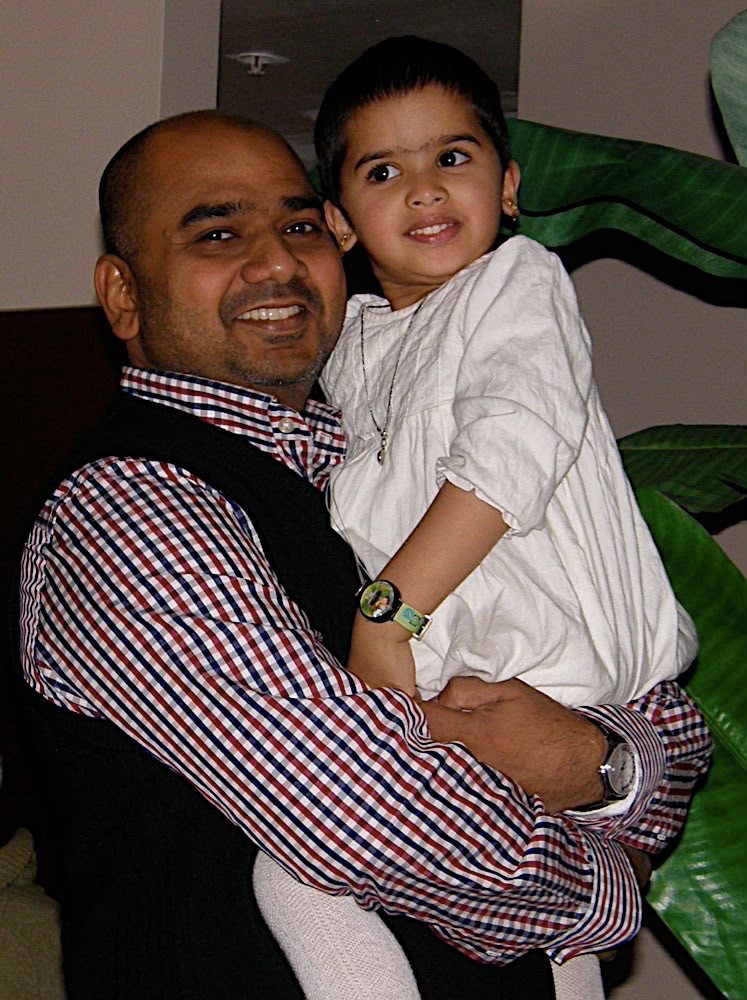 With his youngest child Minmini, who is now studying law and finance. (Supplied photo)