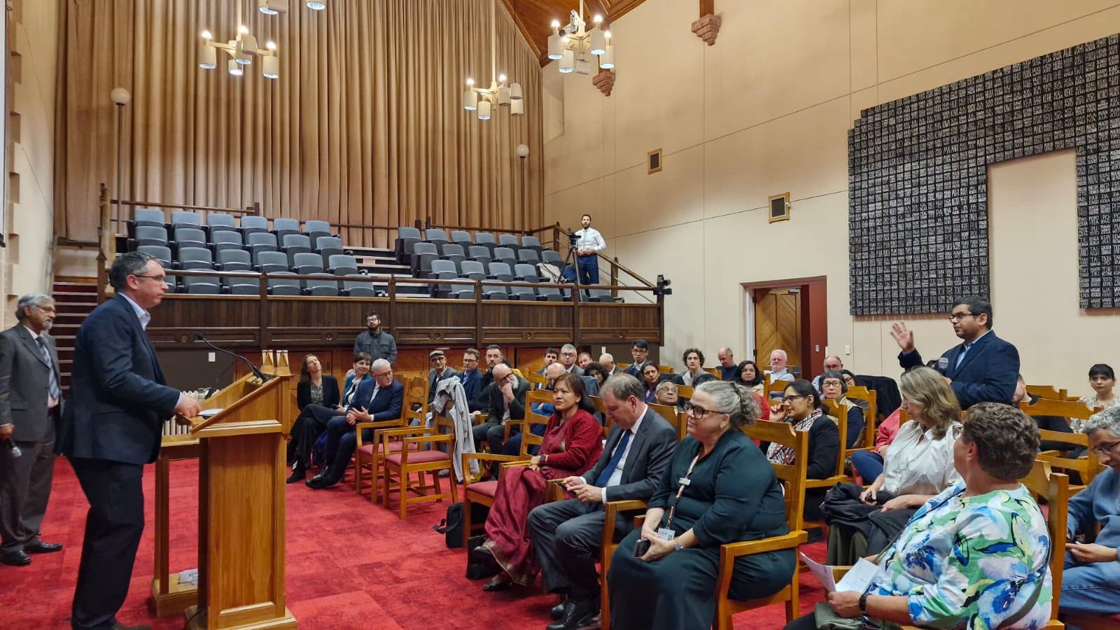India's high commissioner Muanpuii Saiawi (sitting in red) at the event on July 22, 2026. (Supplied photo)